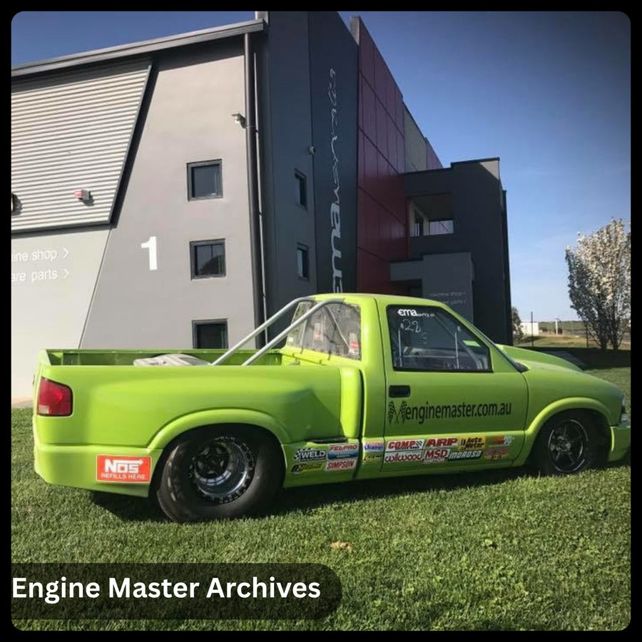 The green ute outside Engine Master
